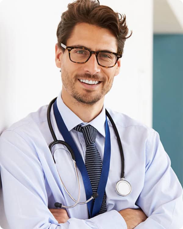 A smiling male doctor with glasses and a stethoscope